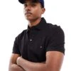 Tommy Hilfiger 1985 Icon Logo Regular Fit Pique Polo Shirt In Black For Men