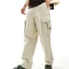 Tommy Jeans Aiden Baggy Cargo Pants In Stone For Men Newsprint -Tommy Hilfiger Store 206380346 1 newsprint