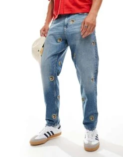 Tommy Jeans Isaac Relaxed Tapered Jeans In Mid Wash With Crest Details For Men Denim Medium -Tommy Hilfiger Store 206859193 1 denimmedium 1