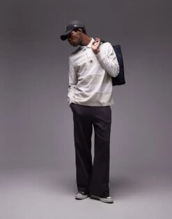 Tommy Jeans Badge Rugby Shirt In Off White Stripe For Men Newsprint -Tommy Hilfiger Store 207285755 2