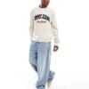 Tommy Jeans Varsity Logo Jumper In Off White For Men Newsprint -Tommy Hilfiger Store 207285844 1 newsprint