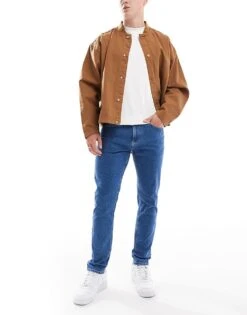 Tommy Jeans Austin Slim Tapered Jeans In Mid Wash For Men Denim Medium -Tommy Hilfiger Store 207285912 1 denimmedium 1