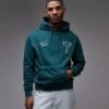Tommy Jeans Varsity Patch Hoodie In Forest Green For Men Evergreen -Tommy Hilfiger Store 207286170 1 evergreen