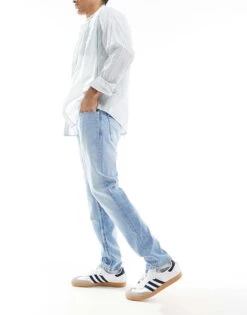 Tommy Jeans Austin Slim Tapered Jeans In Light Wash For Men Denim Light -Tommy Hilfiger Store 207286485 3